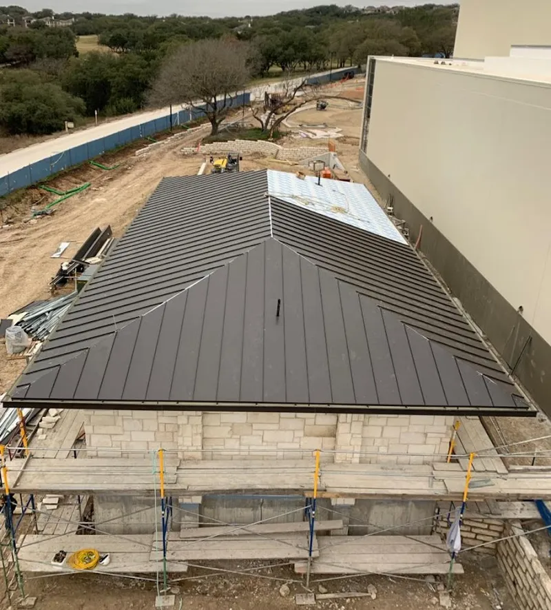 Metal roof new construction with scaffolding in Mansfield